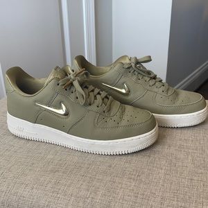 Green and gold Nike Air Force One’s